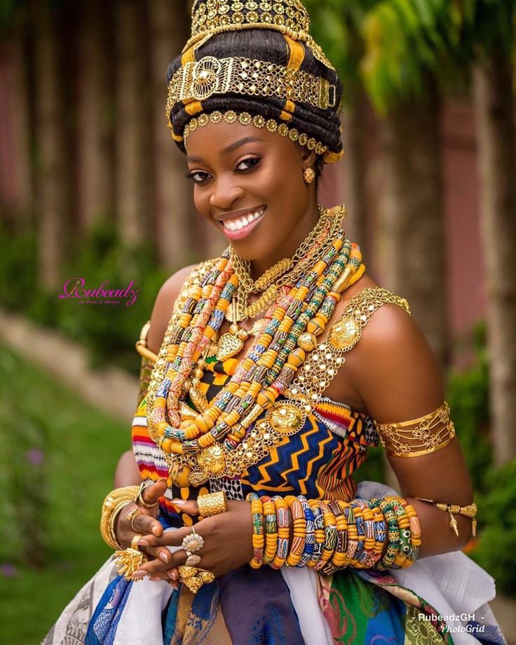 Ghanaian woman wearing beaded traditional jewellery and regalia
